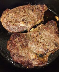 Two steaks in a pan